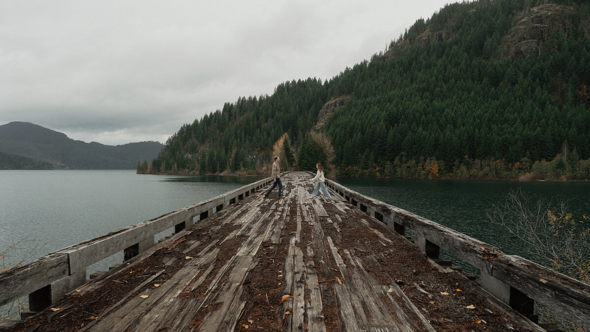Couple on a trestle bridge in Campbell River during their engagement session by latitude 49 photography