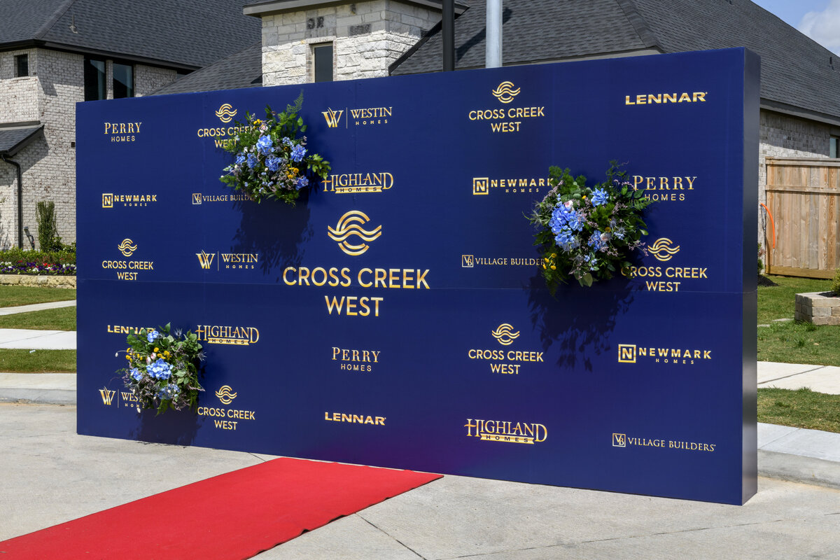 Cross Creek West corporate red carpet event with custom navy backdrop