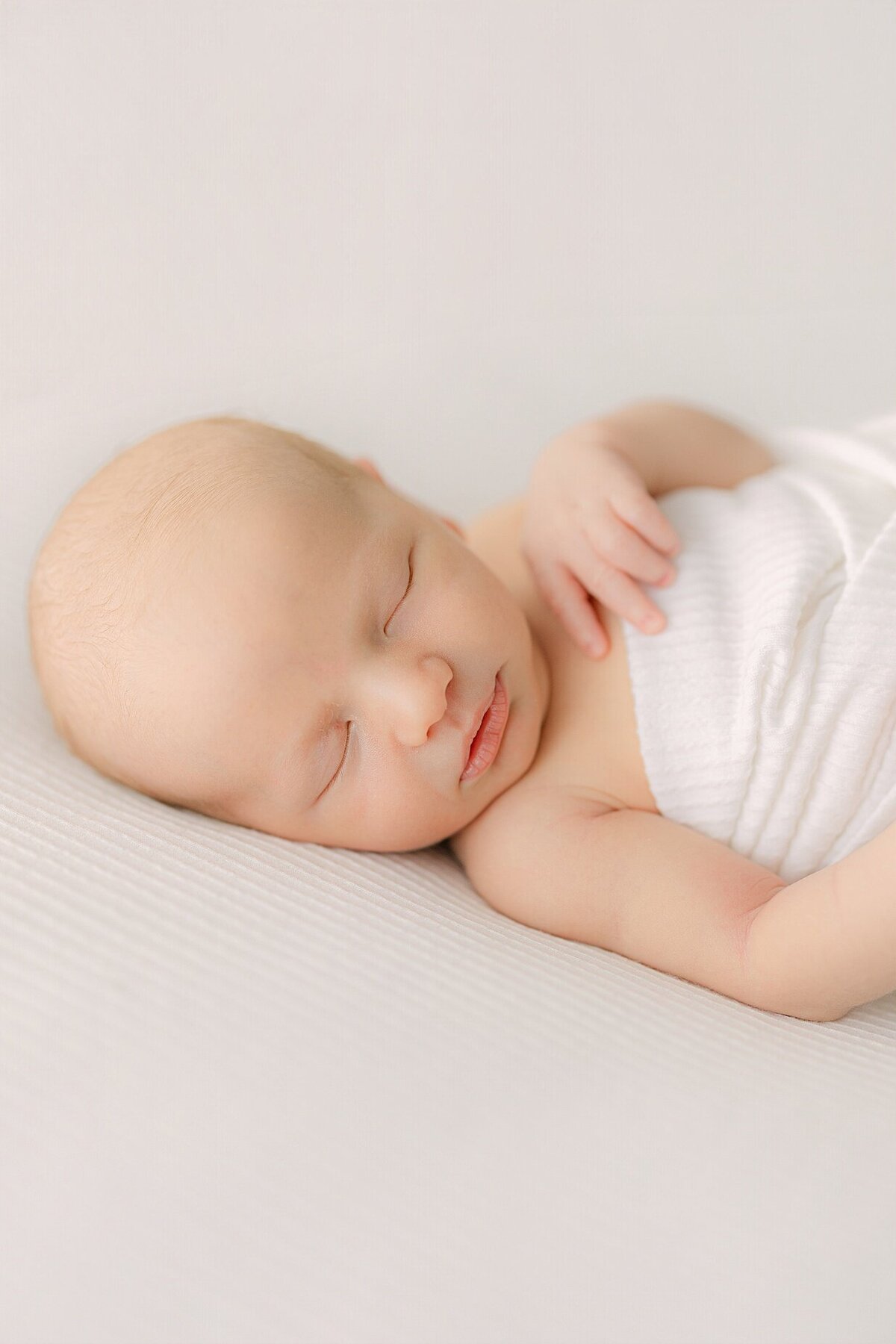 Portrait of a sleeping newborn's face during an Indianapolis newborn photography session