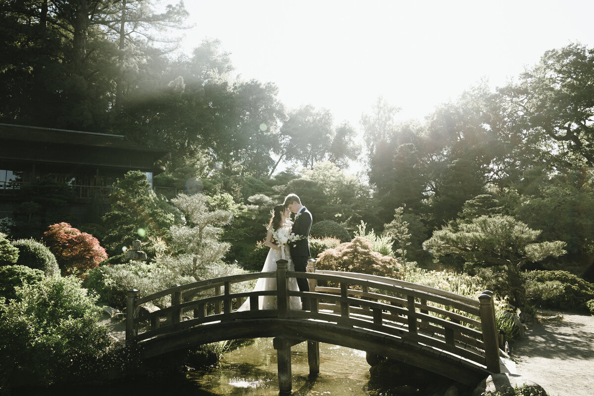 Bride and Groom posing in tea garden