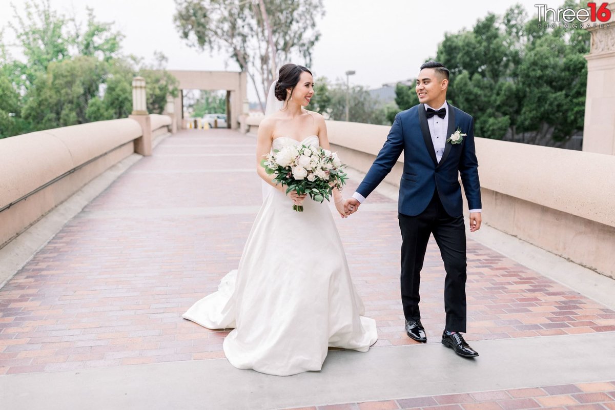 Bride and Groom walk together at the NOOR in Pasadena