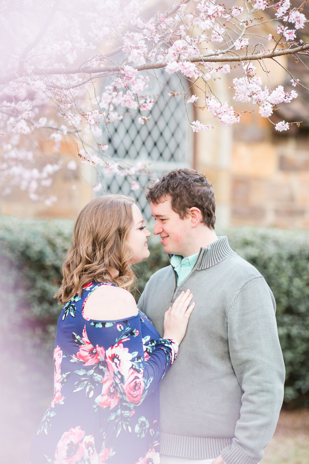 A couple at Berry College in Rome Georgia for light and airy engagement portraits session by Jennifer Marie Studios, top Atlanta Georgia wedding photographer.