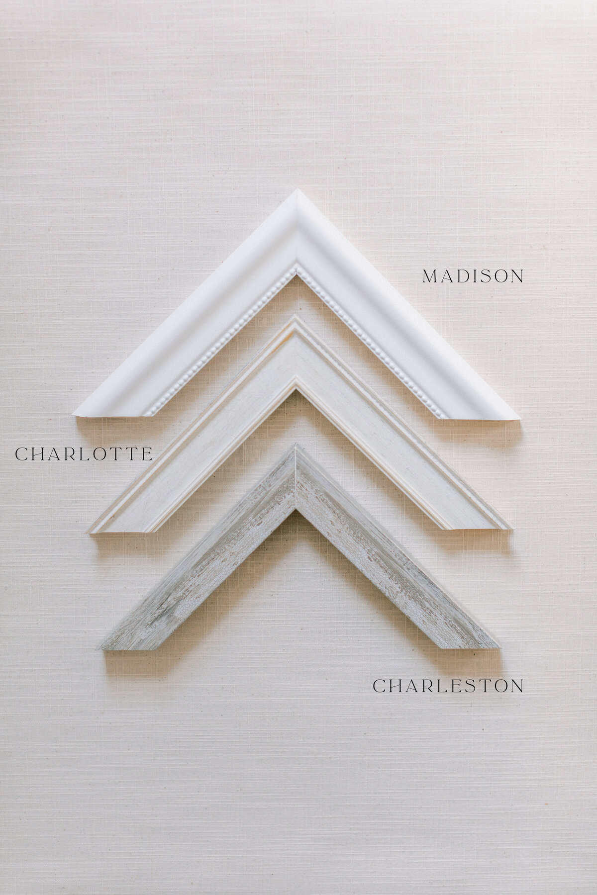 Three frame corners in white, ivory, and washed wood