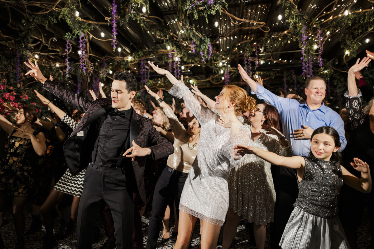 Guests dancing at a wedding reception captured by Hudson Valley wedding photographers
