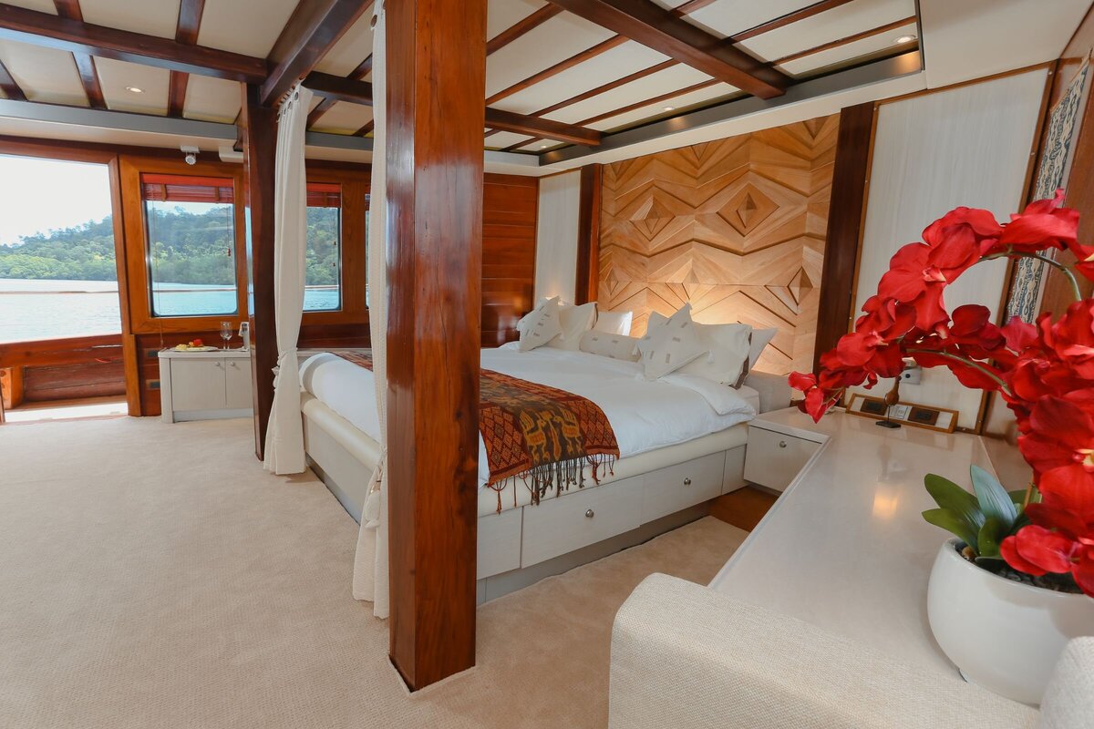 Relax in the exquisite master cabin onboard Lamima, Indonesia's luxury superyacht.