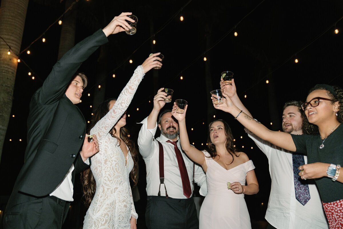 film style wedding photography of bride and groom celebrating