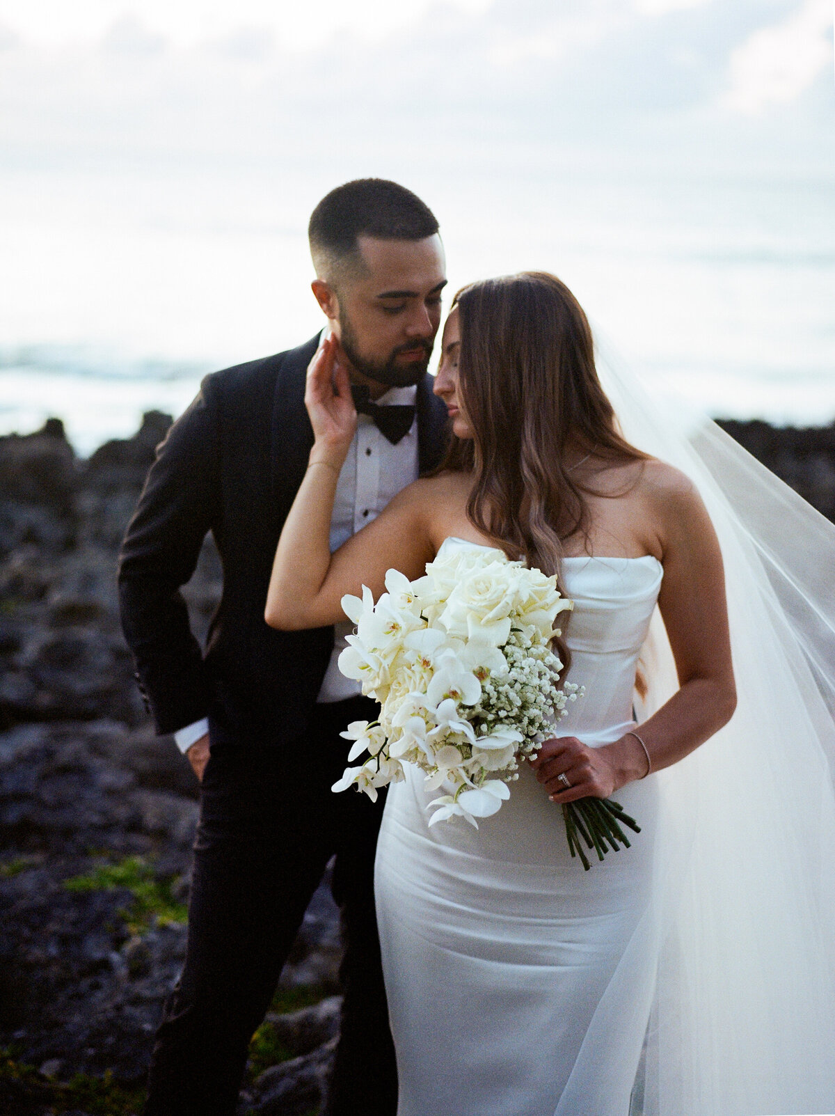 Romantic photos of a couple on the beach, captured in a candid wedding photography style — Carmel wedding photography by Kate Winters Photography.