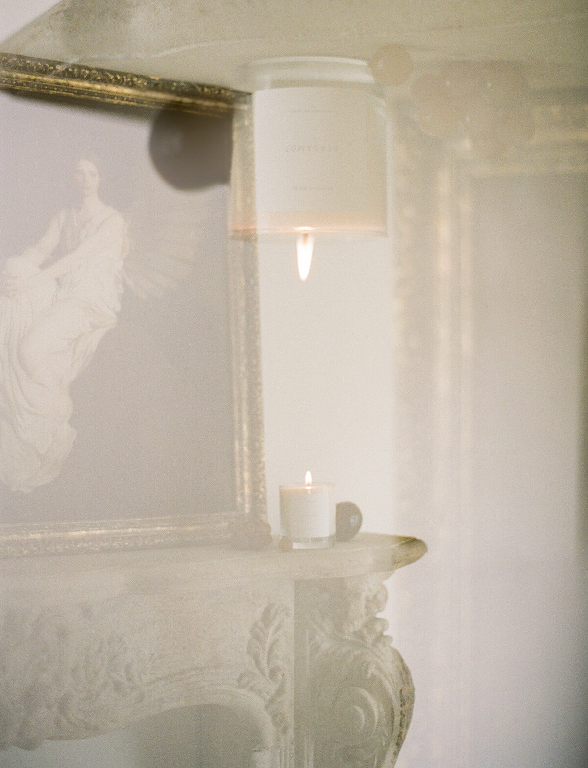 film double exposure, candle branding photo, artistic scent photo, ornate mantle with fruit and painting