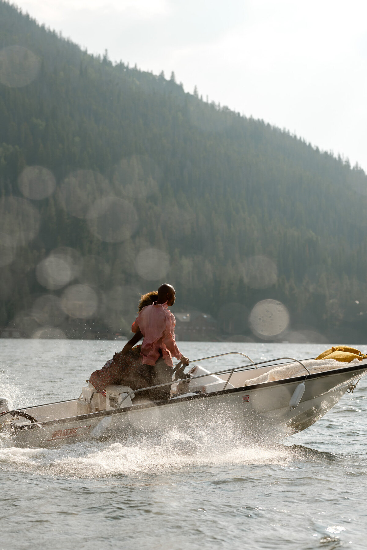 colorado couple speeding away on their boat on the lake