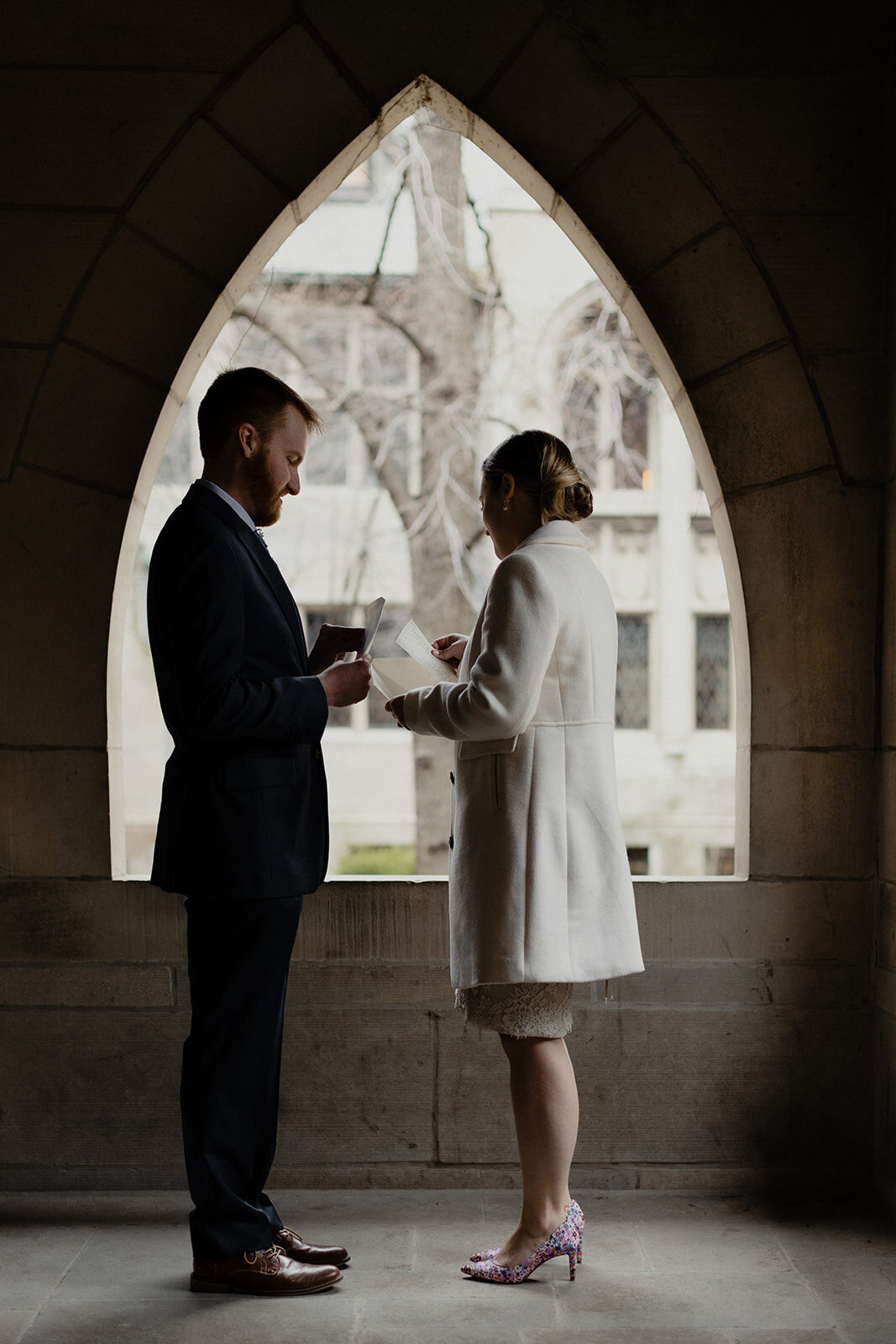 Just Married photo session couple in an old Chicago church cloister and read their hand written vows to one another