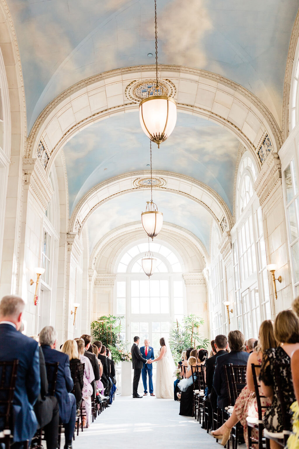 Bride and groom stand at altar inside Hermitage Hotel in Nashville