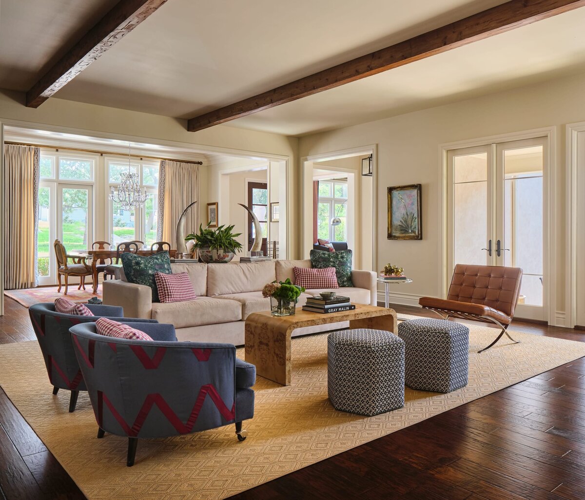 the keeping room interiors lilac living room with blue chairs and wooden coffee table with rug