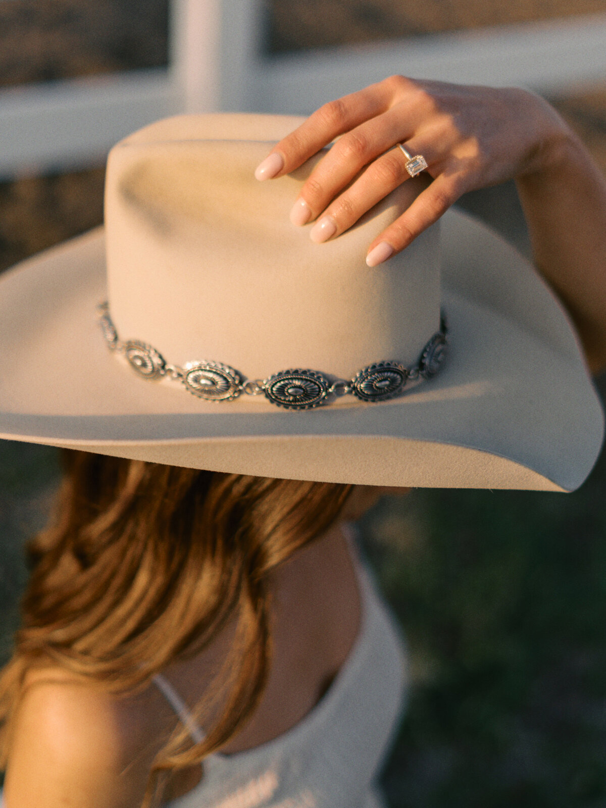 cowboy-hat-engagement-ring-sunset