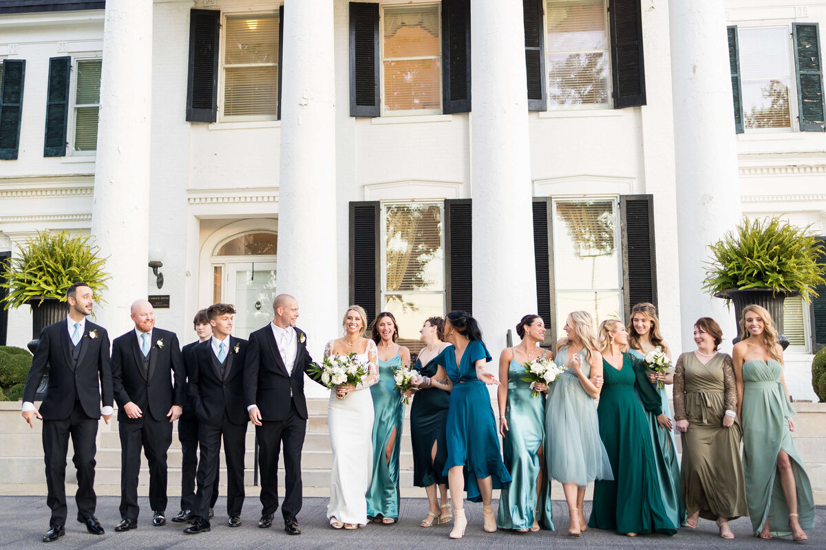 Bride and groom with wedding party at The Carrick House Wedding venue in Lexington, KY