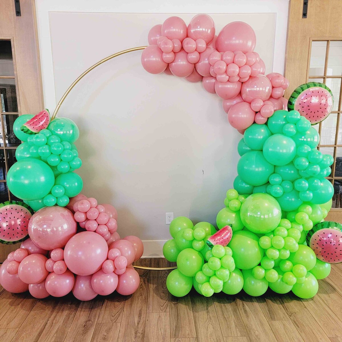 A refreshing celebration with Air with Flair Decor's Custom Balloon Installation featuring a Watermelon-themed.the event in the vibrant colors and juicy vibes of our expertly crafted balloon artistry, creating a unique and memorable event.