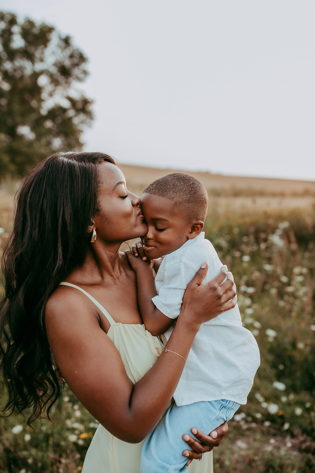 Mother hugging her son during a family session in Waterloo, Ontario.