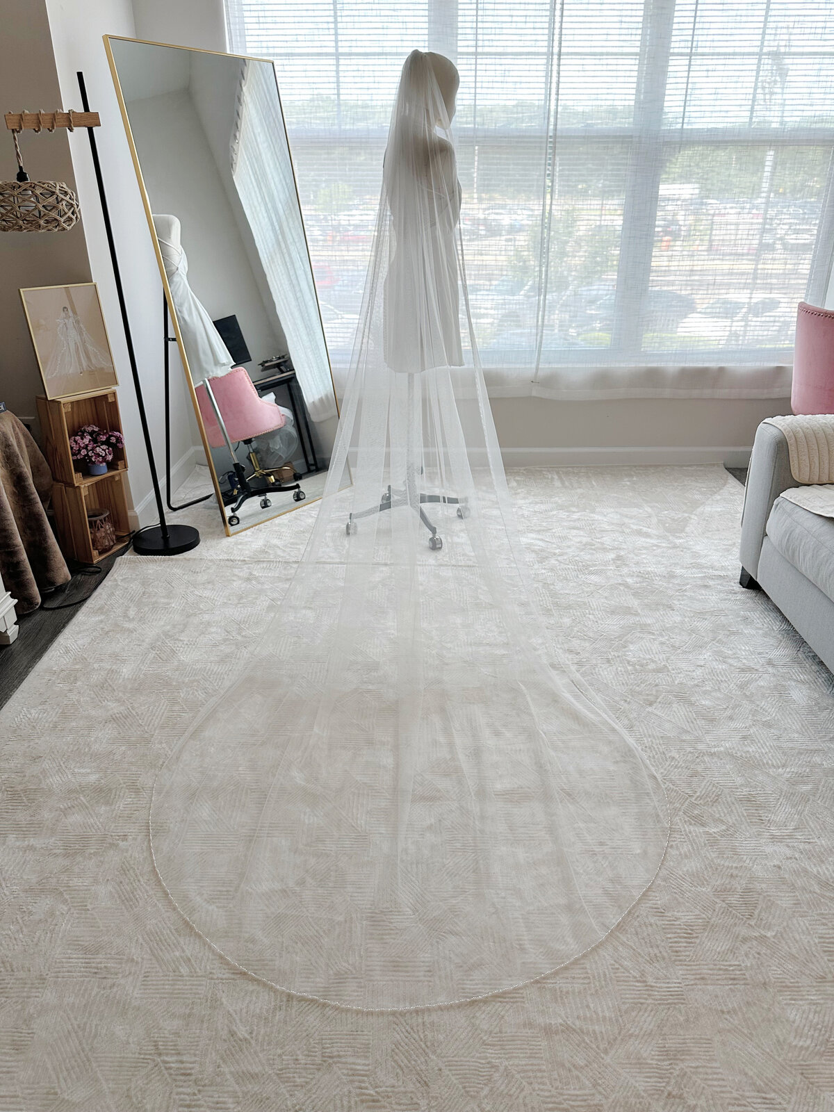 Handcrafted veil with subtle beading along scalloped edge
