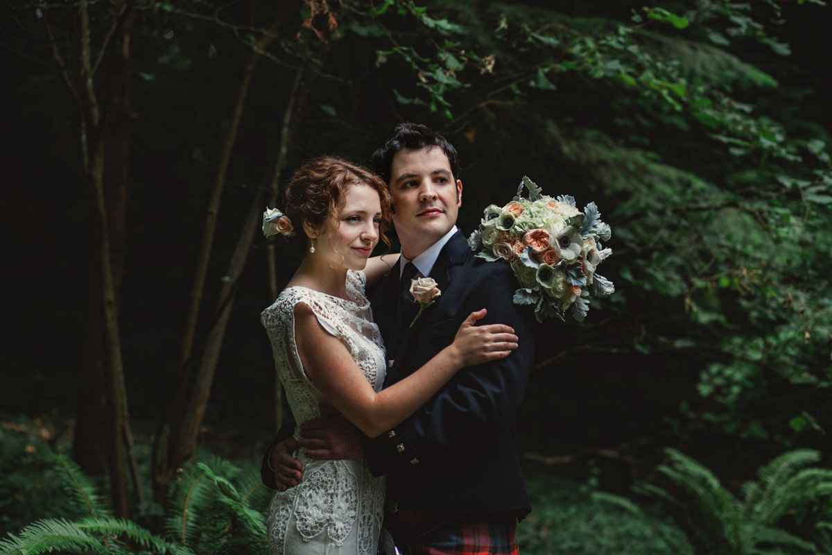 Beautiful portrait of bride and groom outdoors in the woods by best wedding photographer in portland Oregon Susie Moreno Photography