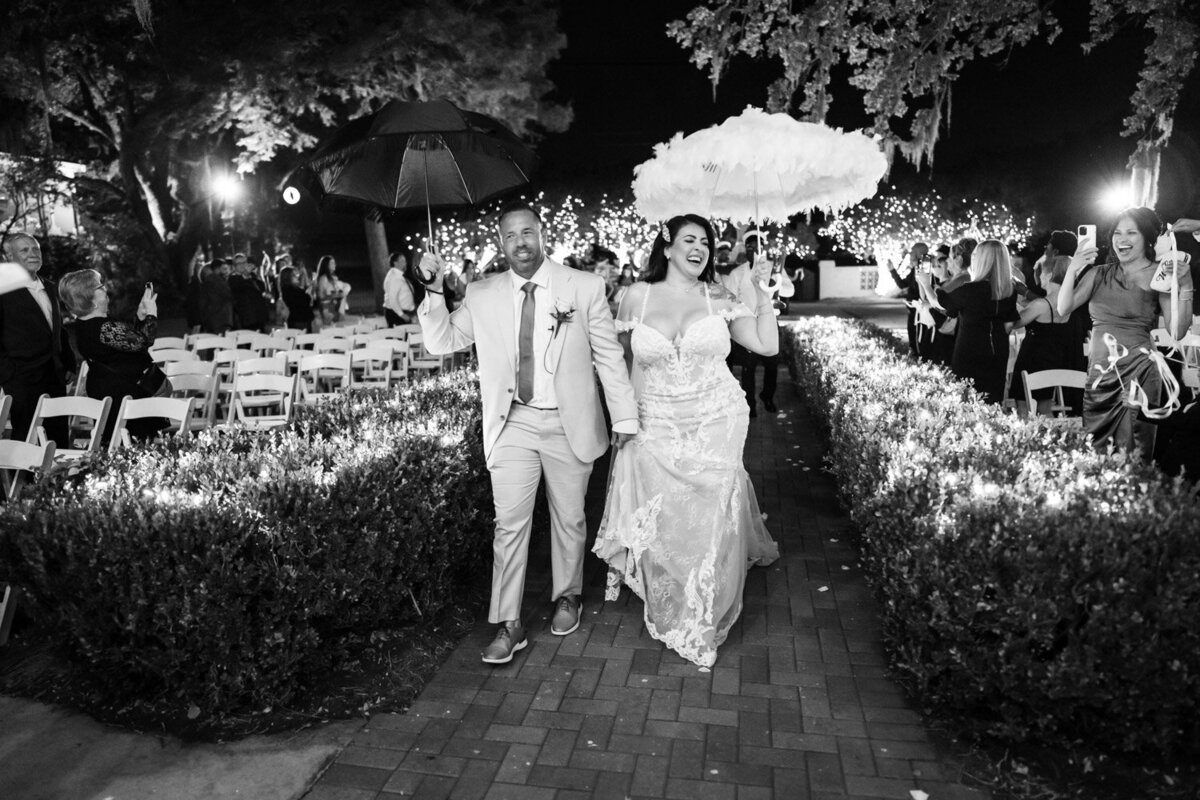 Bride and groom walking down the aisle