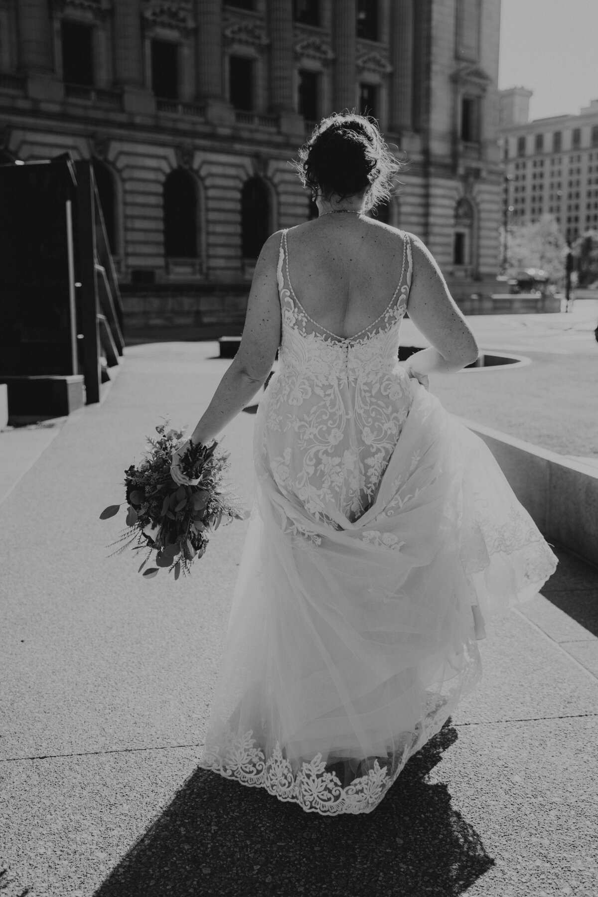 Bride walks through Downtown Cleveland