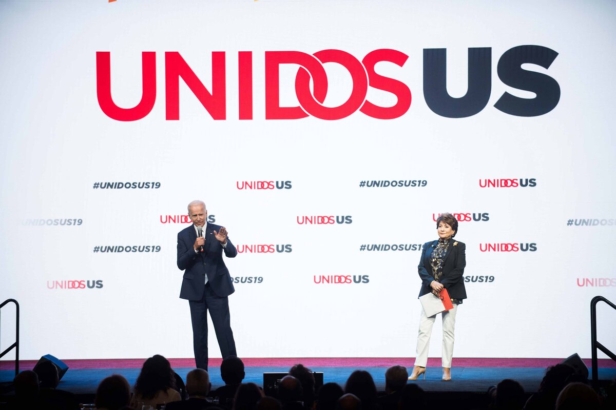 Joe Biden speaks in San Diego at UNIDOS US Expo with UNIDOS logo behind him