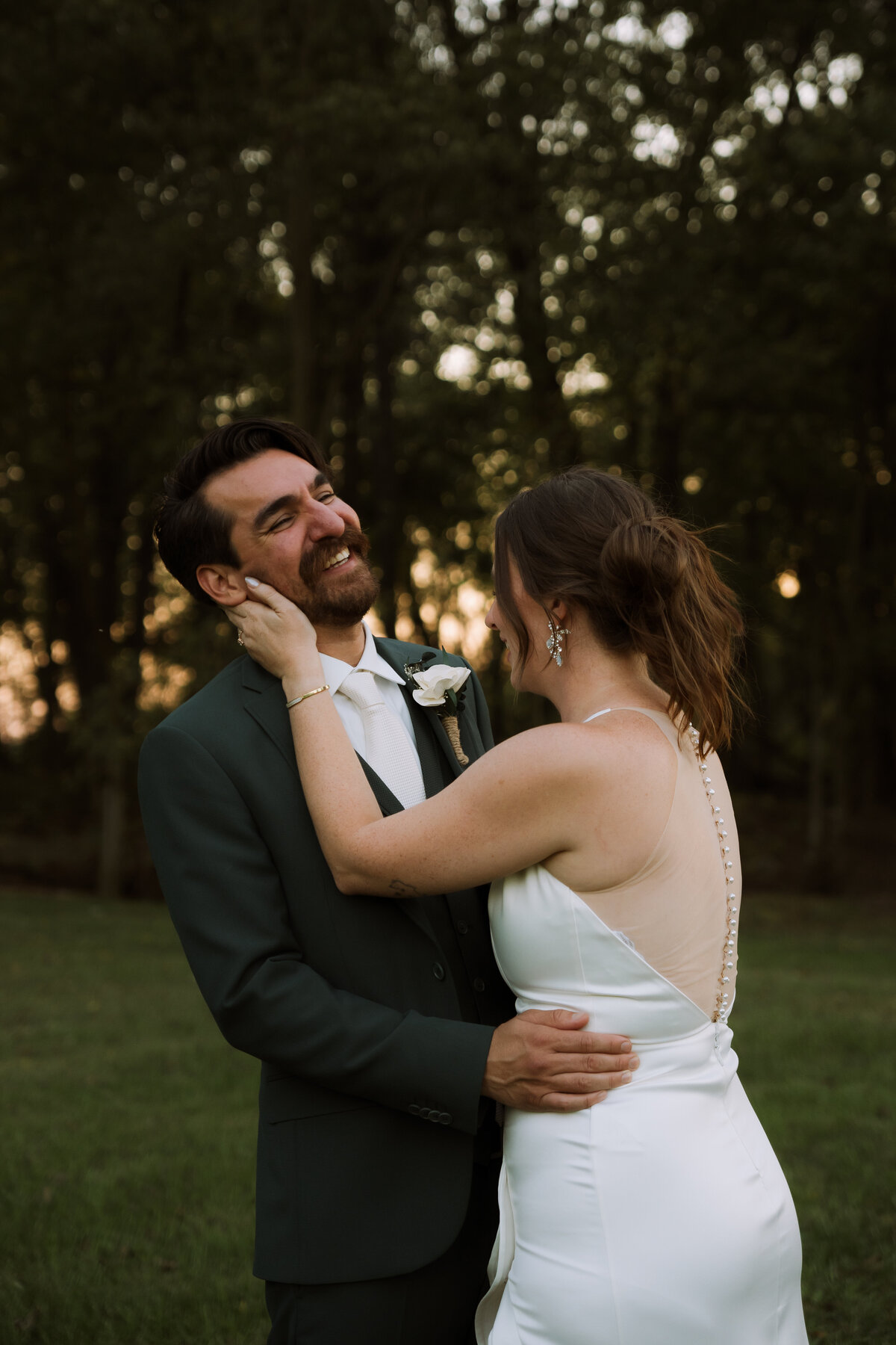 bride and groom sharing happy moment, candid wedding photography