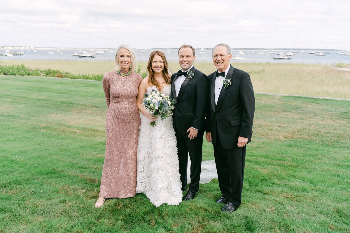 bride's family overlooking atlantic ocean on cape cod