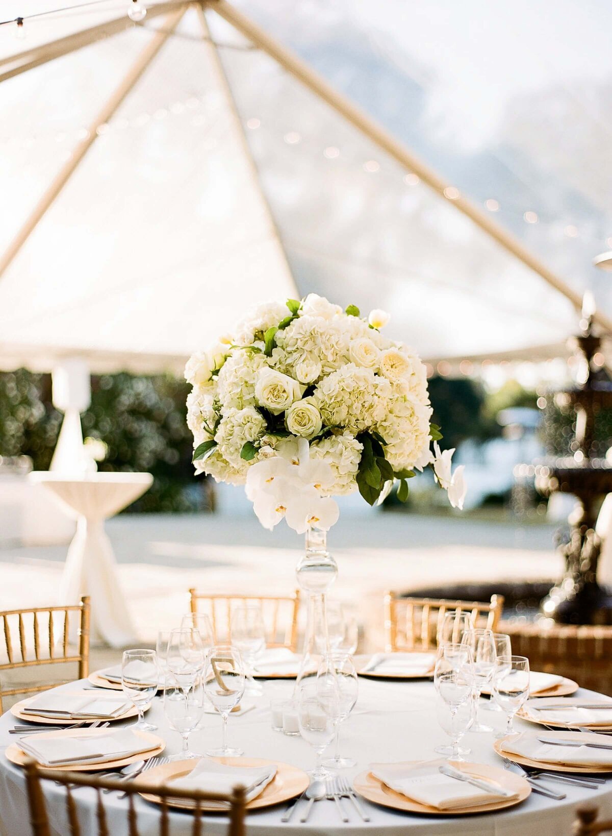 wedding reception decor in a tent