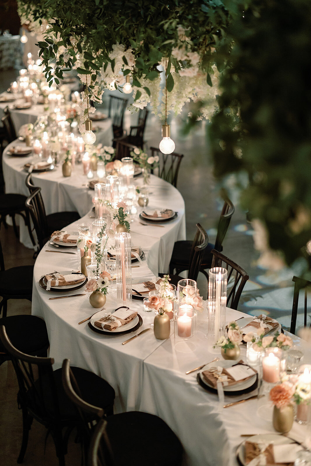 Kate-Murtaugh-Events-warehouse-wedding-planner-serpentine-table-flowers-black