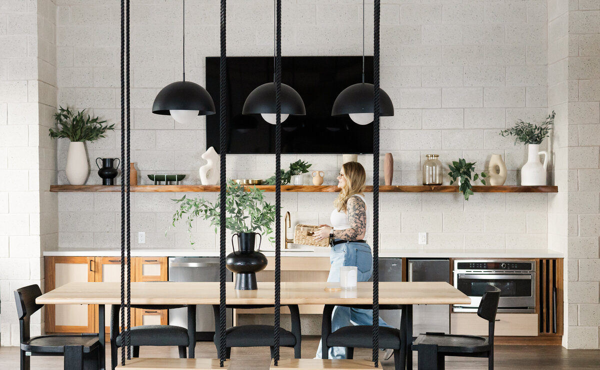 woman-walking-organizing-kitchen