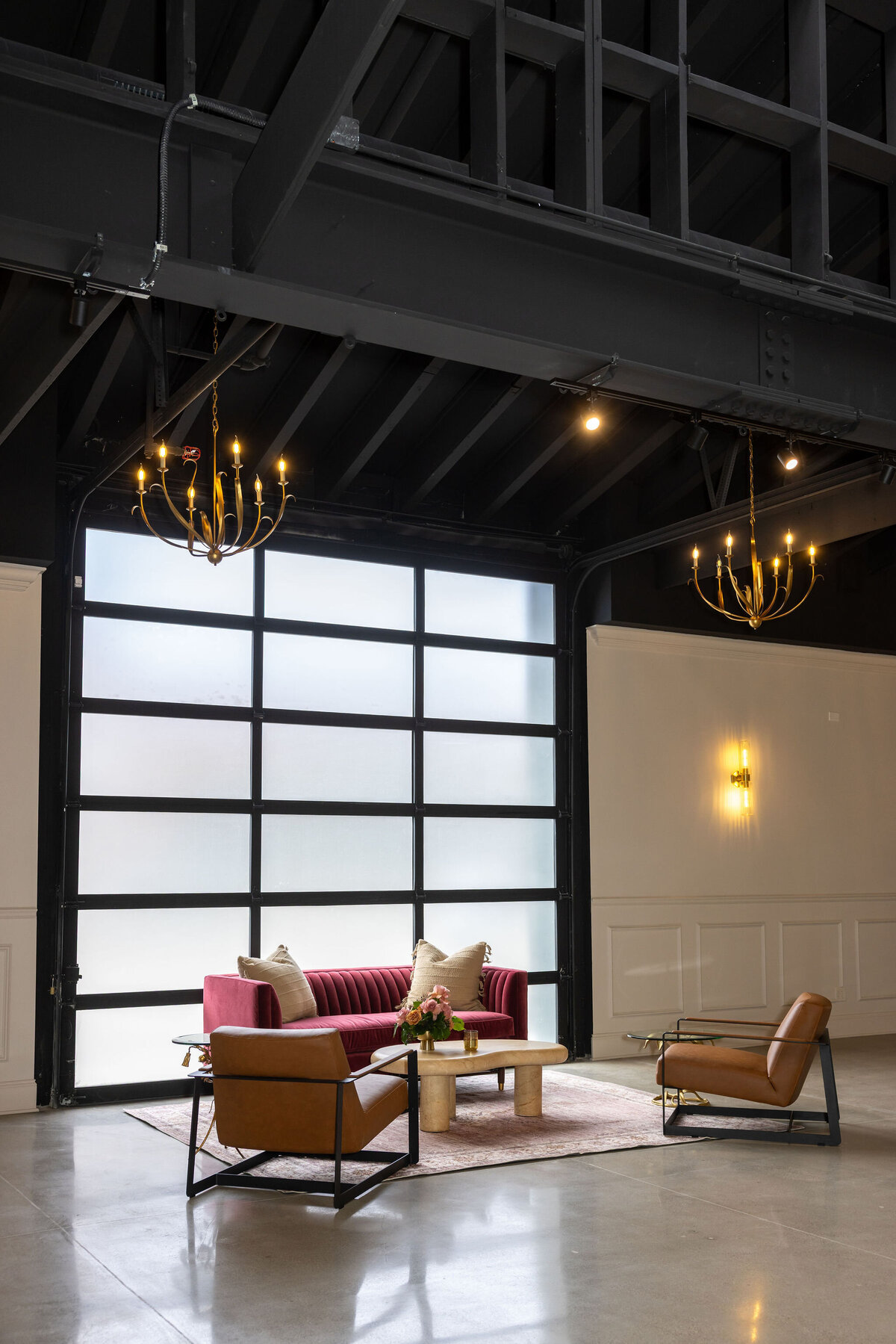 Happy Hour in-house lounge vignette, natural lighting from industrial yet elegant garage wall