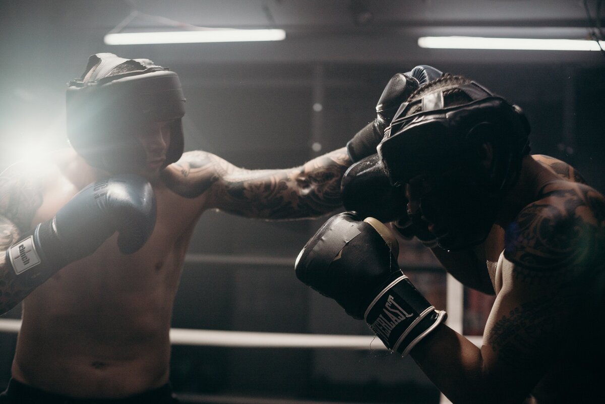 two guys boxing a gym