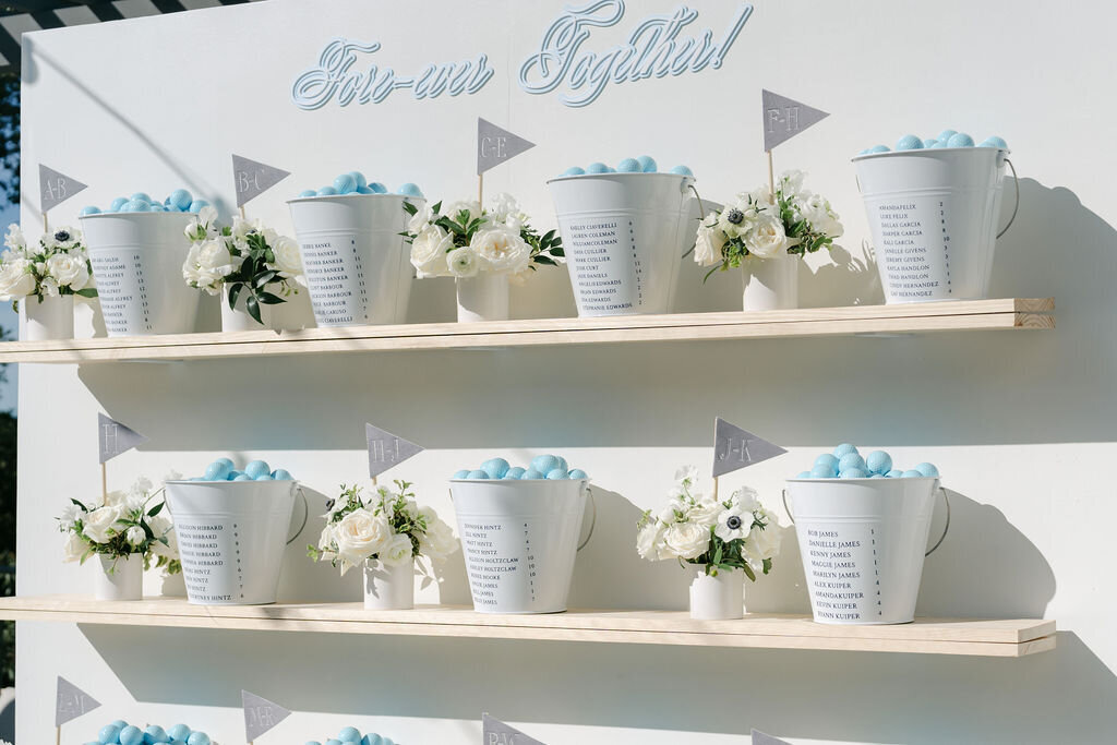 seating chart, golf balls, cocktail arrangements