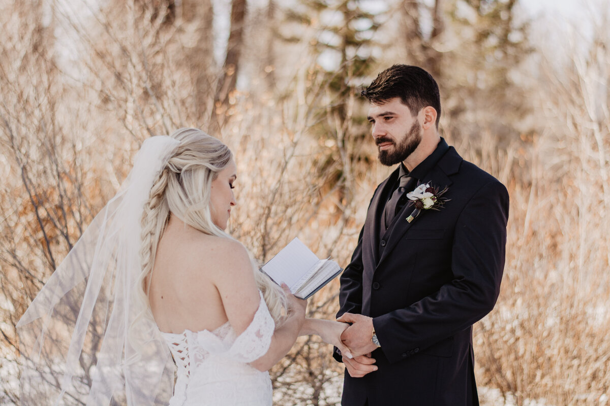 Jackson Hole Photographers capture groom listening to bride