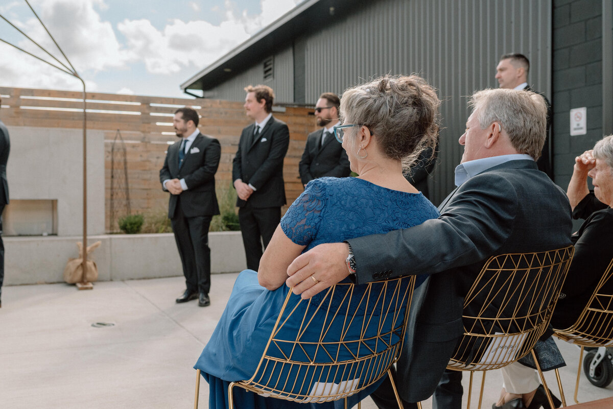 parents of groom watch ceremony