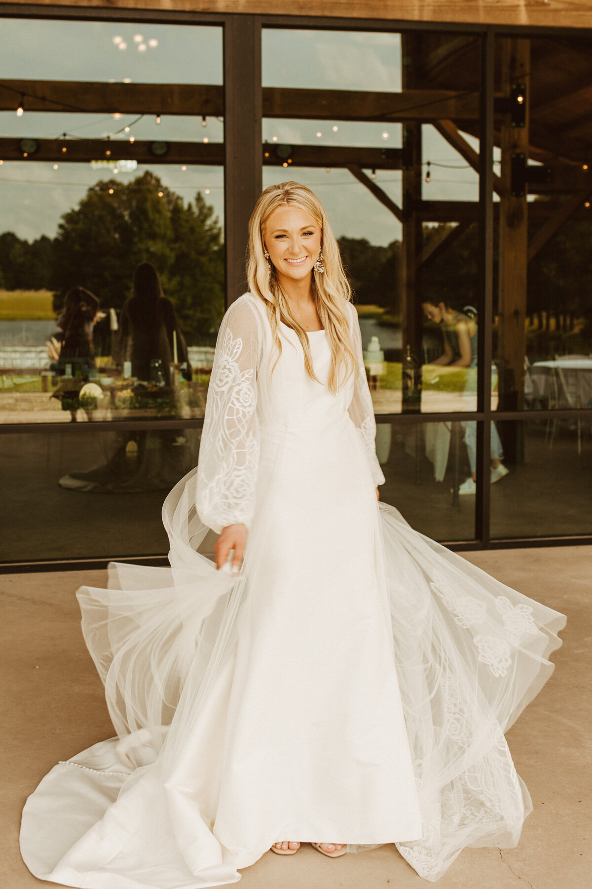 bride in long sleeve dress