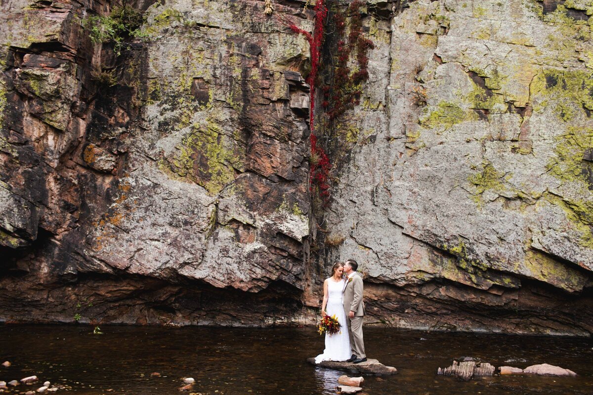 wedding-couple-in-river-at-planet-bluegrass