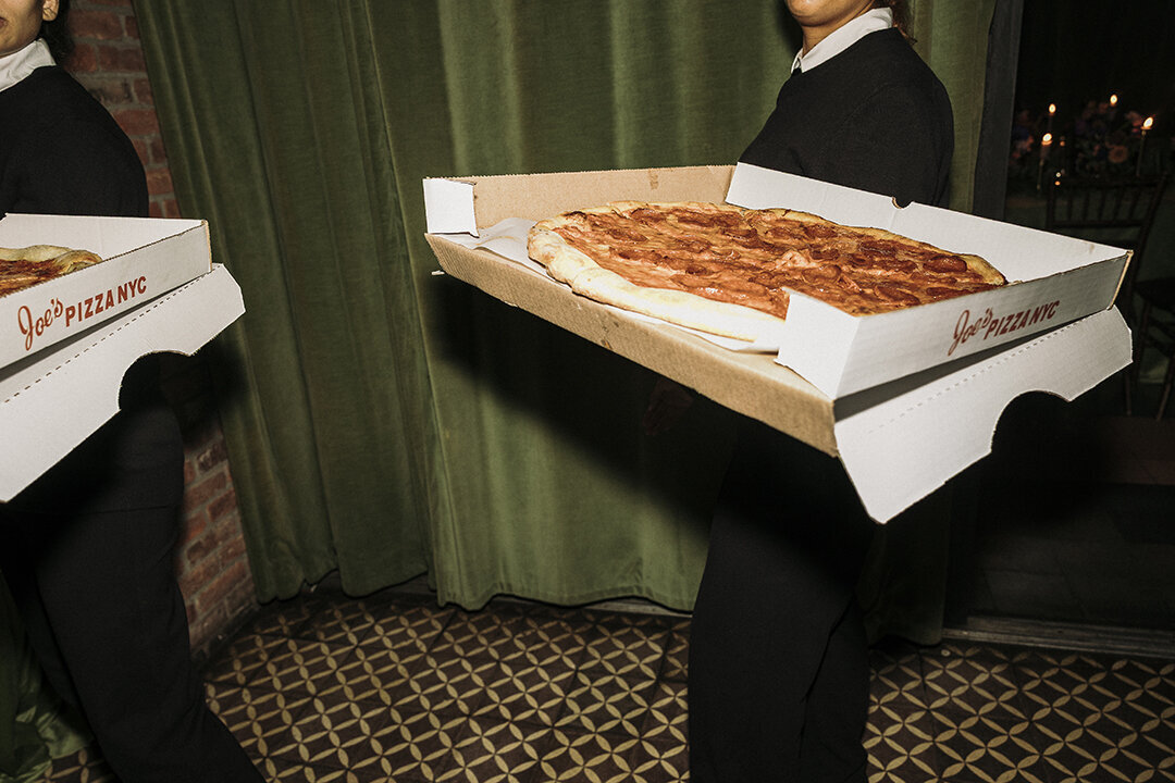Hot pepperoni pizza pie being served at The Bowery Hotel in NYC. Photo by Mira Park Photography.