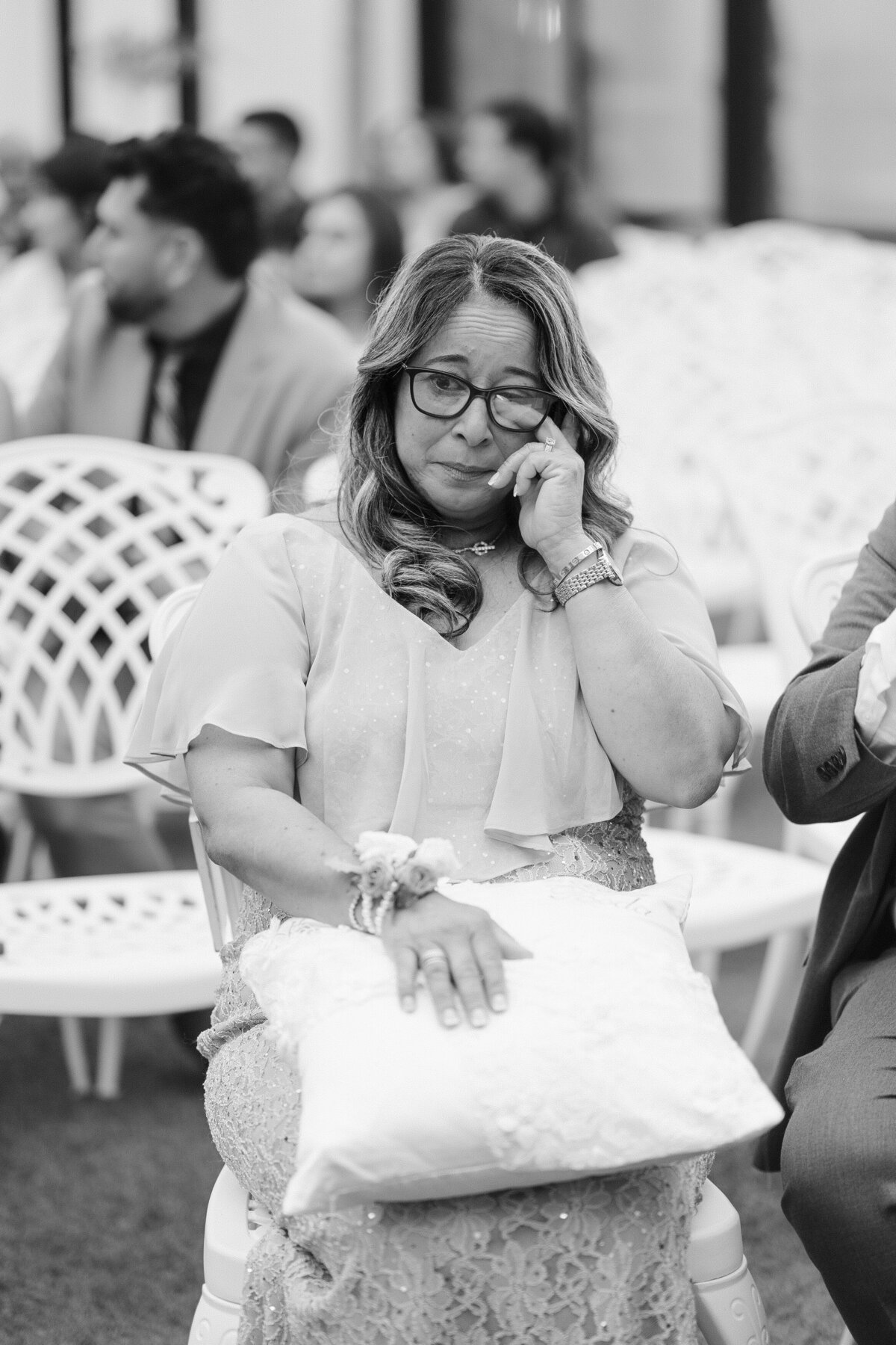 mother of groom crying at ceremony