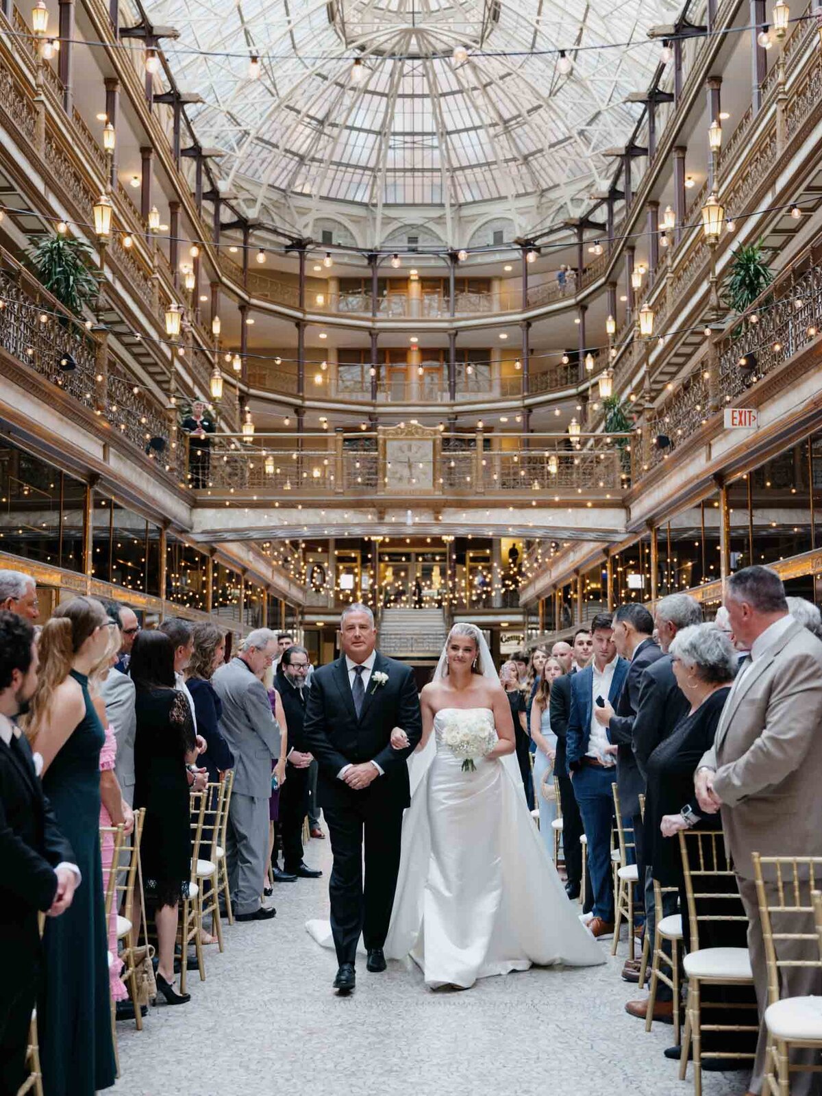 Wedding ceremony under glass ceiling at The Arcade Cleveland