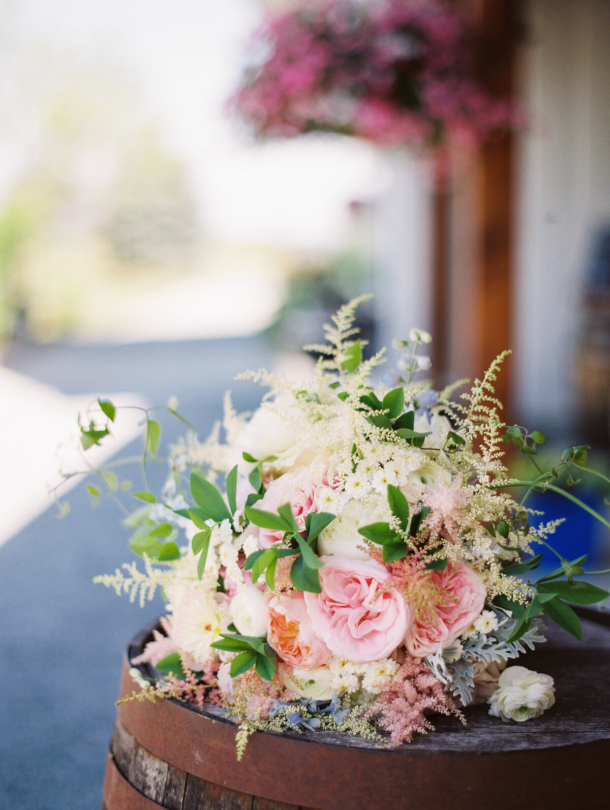 Close-up photo of a pink, white and green flower bouquet