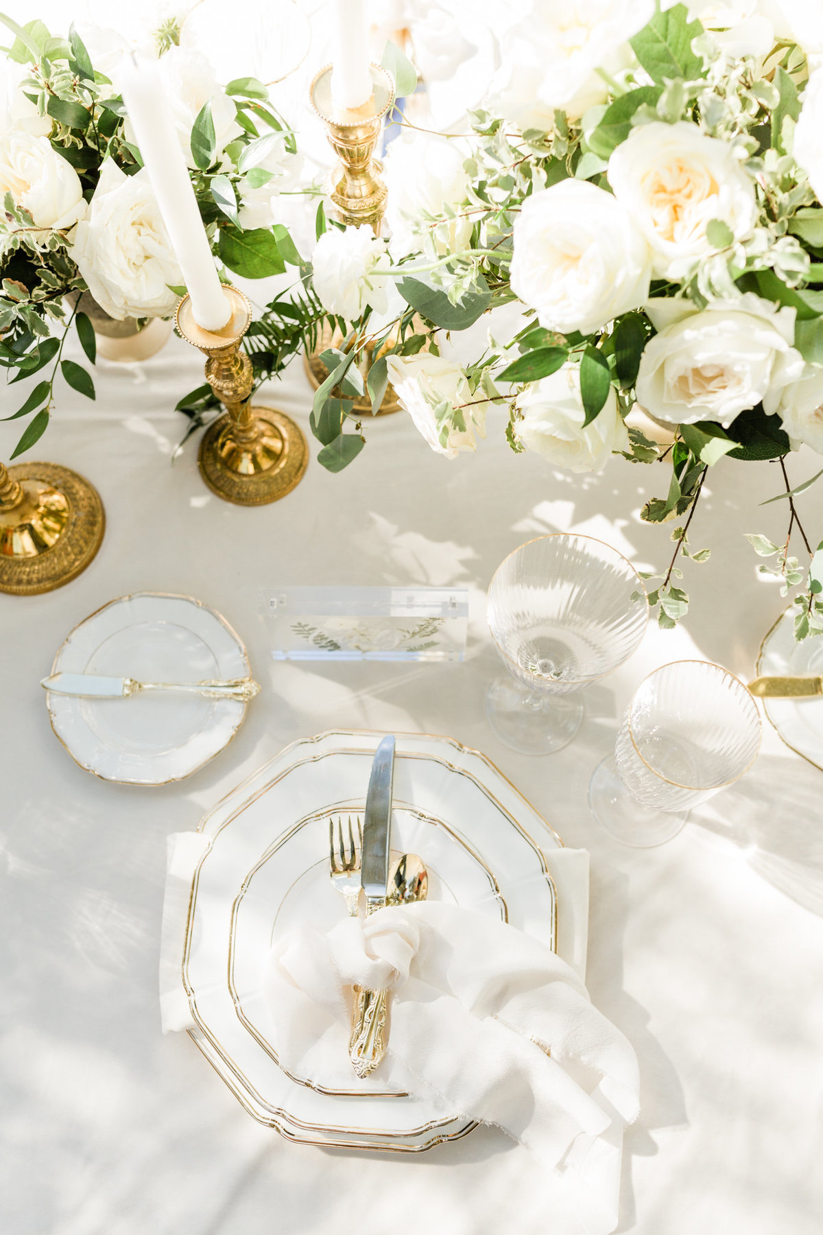 white and gold wedding reception decor
