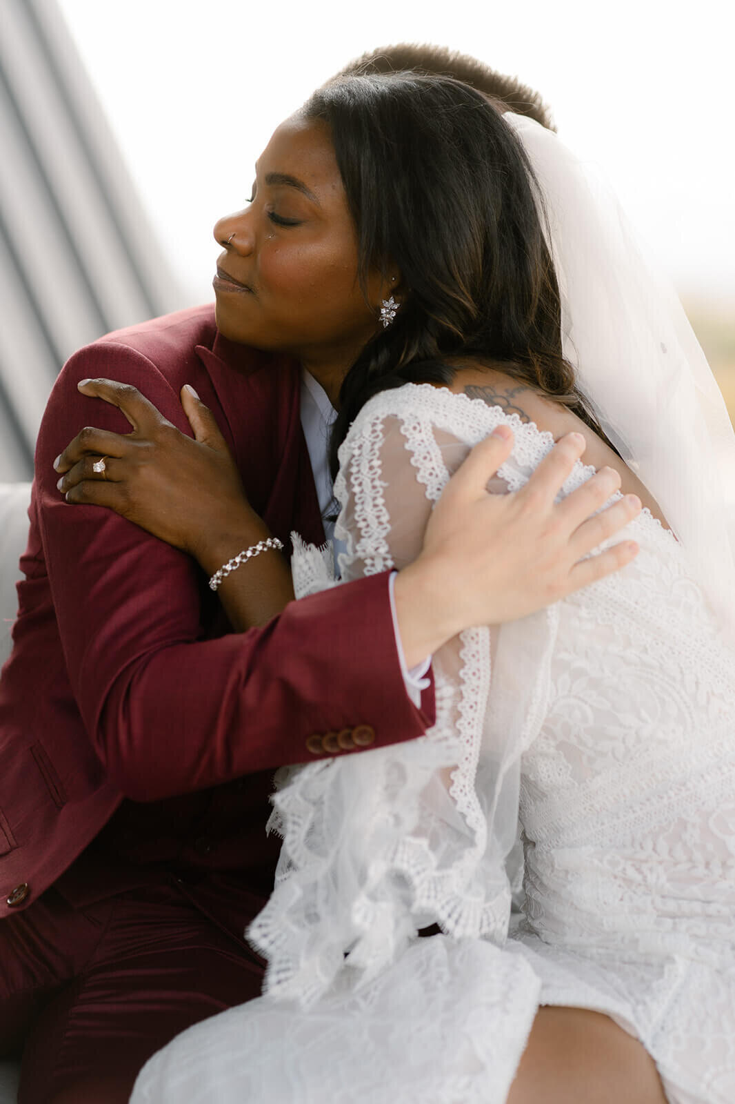 couple hugging and crying during private vows
