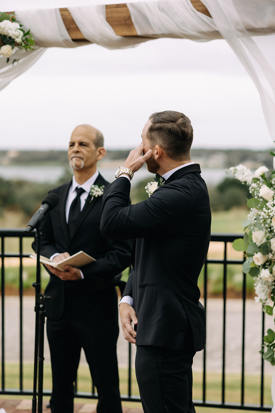groom crying at ceremony at bella collina wedding photos​