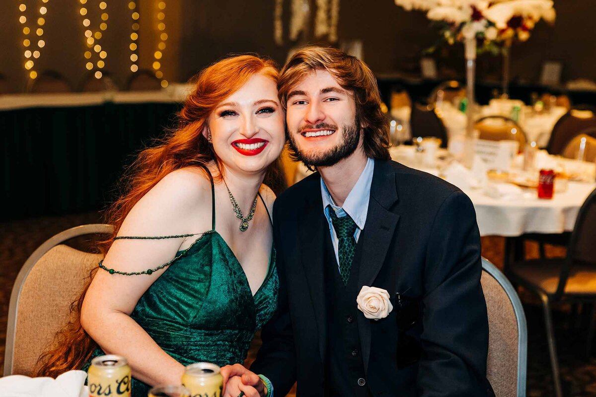 Wedding reception photo of bridesmaid with her boyfriend, Broadway River Inn, Hamilton, MT