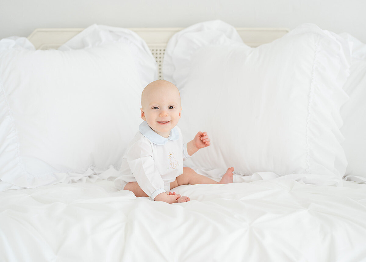 baby boy wearing a grandmillenial style outfit photographed in brunswick photo studio