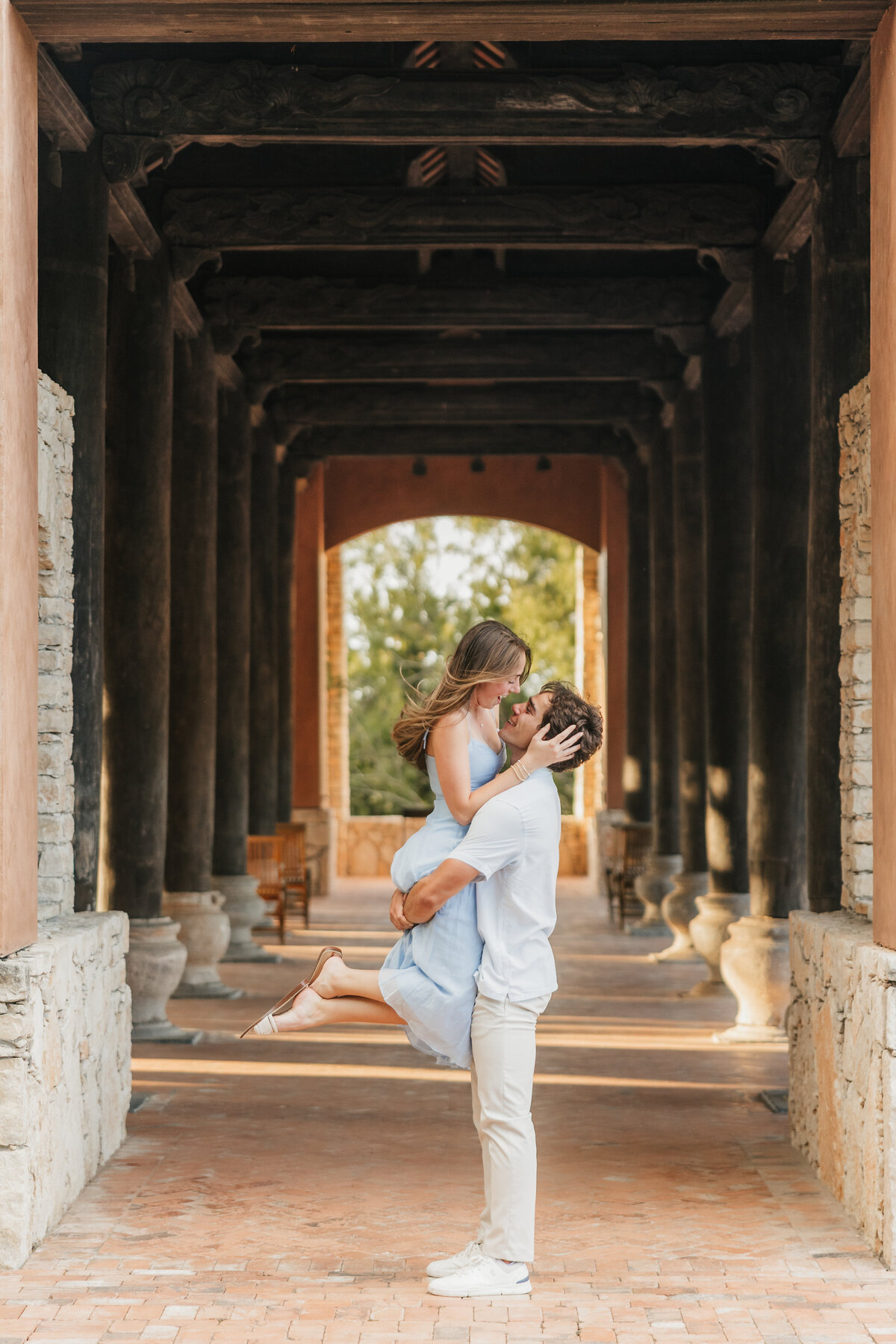 groom-picks-up-bride