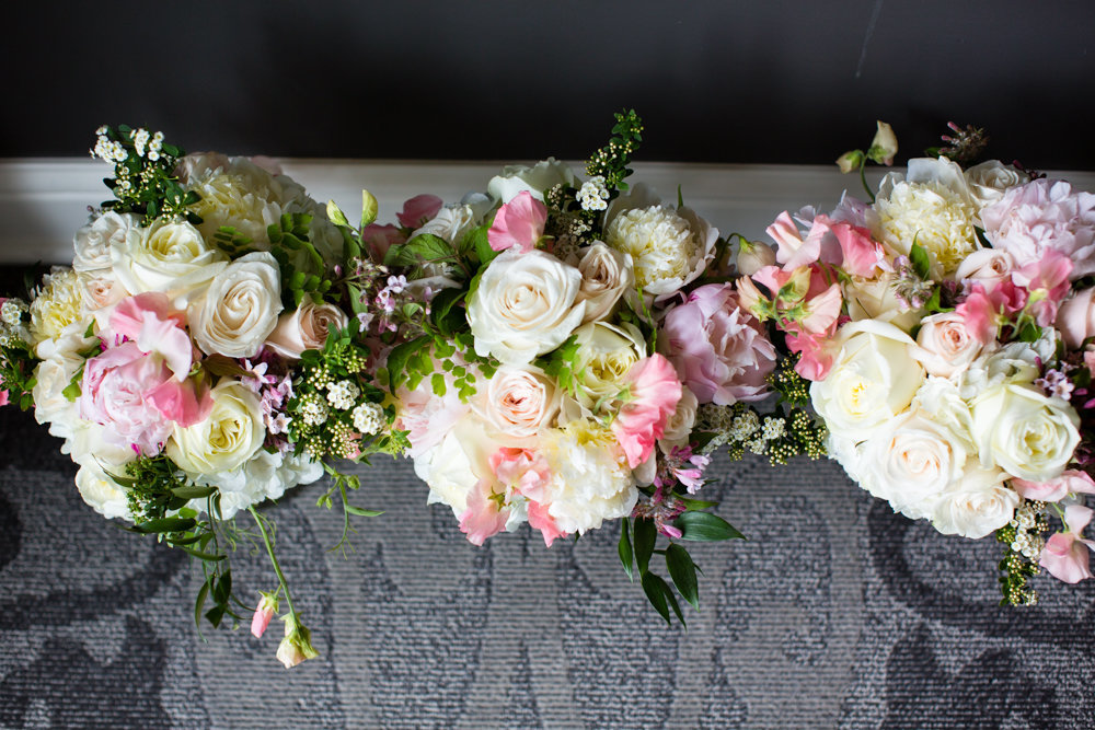 Lovely blush spring bridesmaids bouquets with blush peonies.