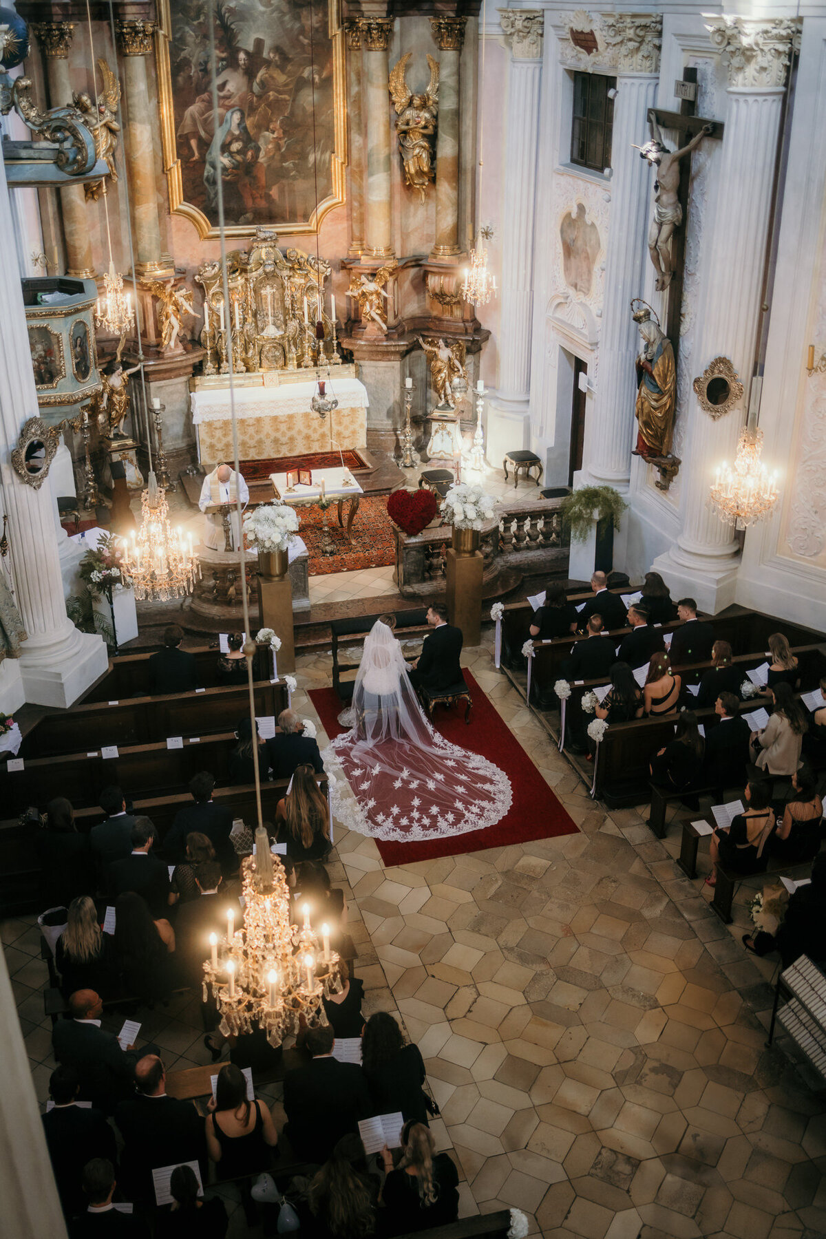 Katholic church wedding ceremony captured from a balcony.