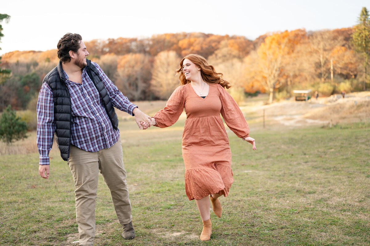 A beach engagement session on Lake Michigan.  Taken by Trisha Marie Photography